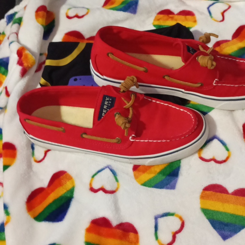 Red pair of women's size 8 Sperry slip ons